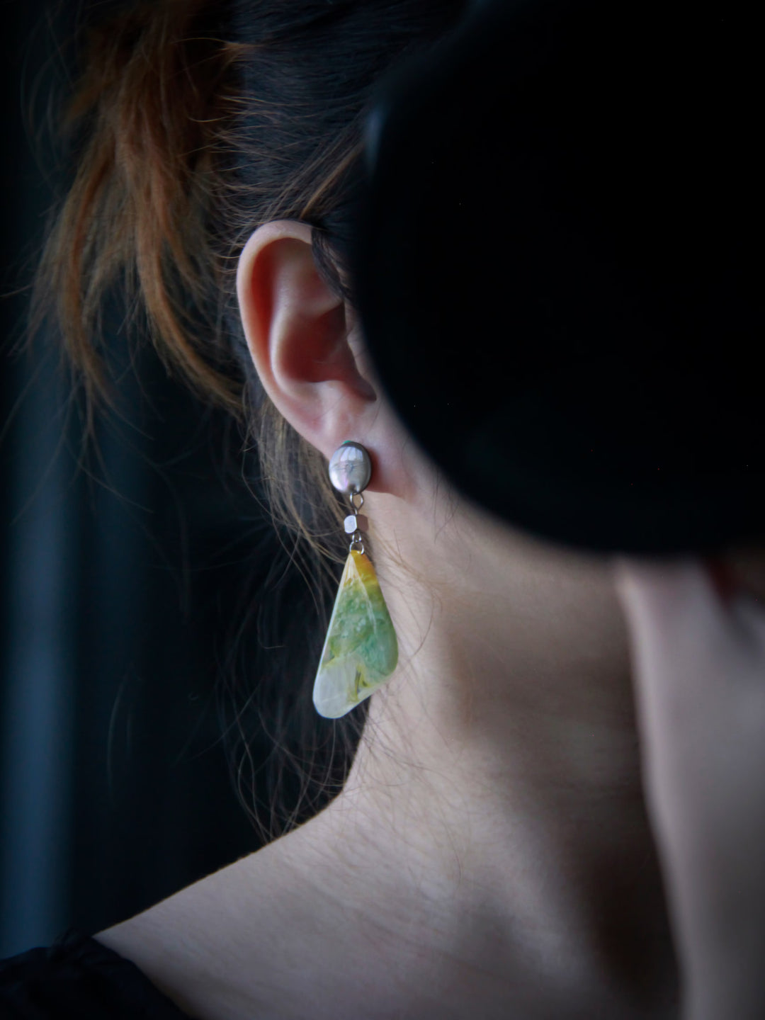 Model wearing GF-002 earrings by Artist Jun